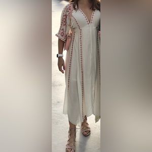 White maxi dress with thread detail